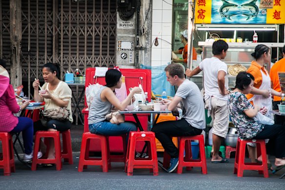 A classic Thai street food market on Yaowarat Road in Bangkok’s Chinatown neighbourhood.