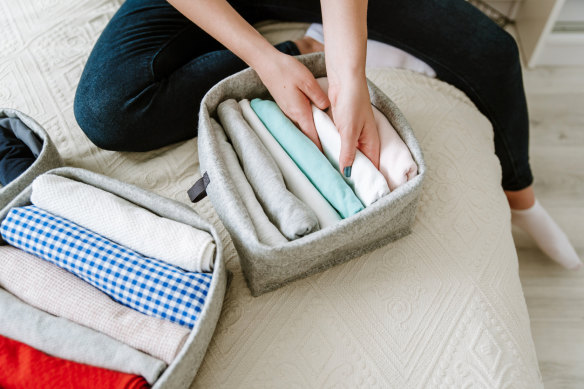 The KonMari method dictates that you strive to only keep objects that “spark joy” and then organise them according to her strict system, with clothes folded into neat rectangles and stored vertically.