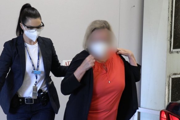 NSW Police arrest Sydney teacher Helga Lam on Friday morning. 