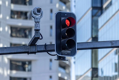 a camera attached to a red light