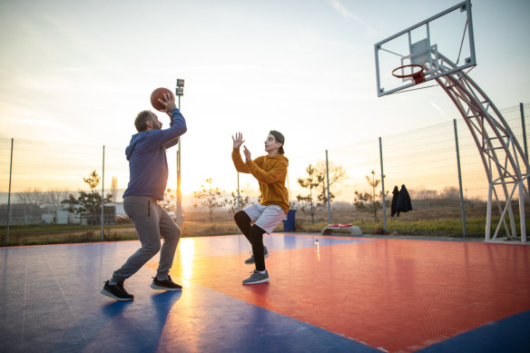 Man clearance playing basketball
