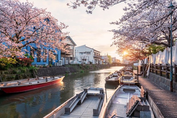 The river in Yanagawa Punting Kanko Kaihatsu at sunset, in Fukuoka, Japan.