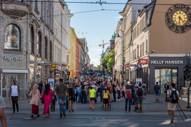 People enjoying the summer at central station street in Oslo, Norway