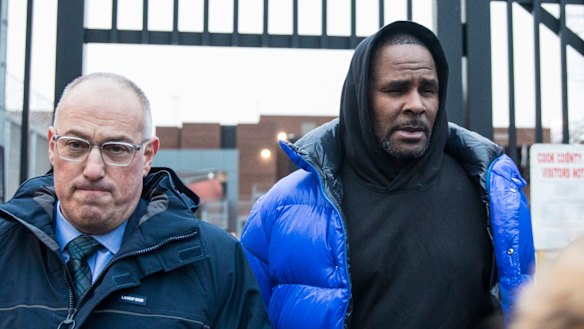 R. Kelly, right, last month entered a not guilty plea to 10 counts of aggravated criminal sexual abuse. 
