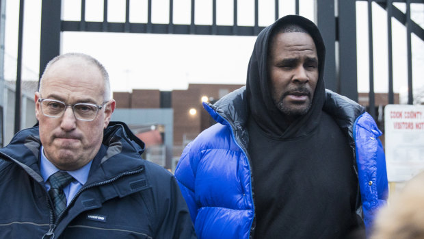 R. Kelly, right, last month entered a not guilty plea to 10 counts of aggravated criminal sexual abuse. 