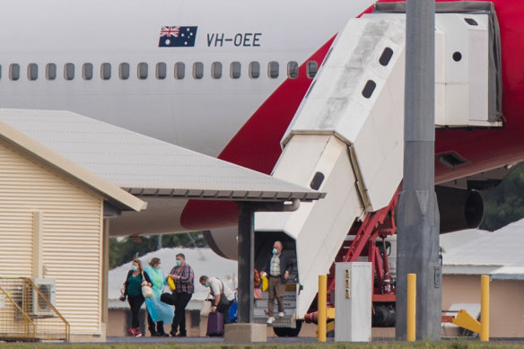 Australian evacuees from Diamond Princess arrive in Darwin on Thursday.