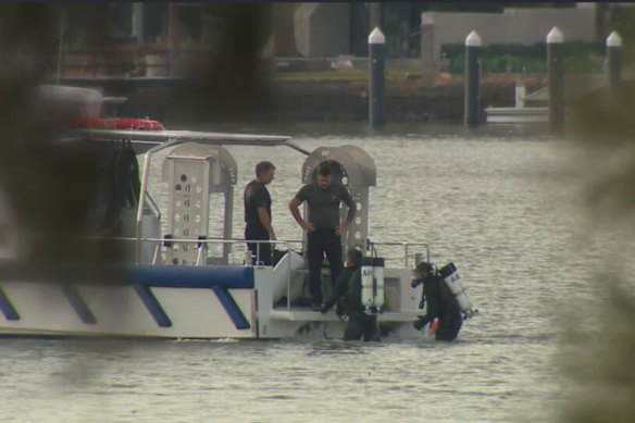 Police divers at Concord on Saturday.
