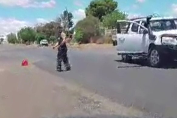 A screengrab of fugitive Julian Ingram in a confrontation filmed weeks before he allegedly shot three people dead in regional NSW.