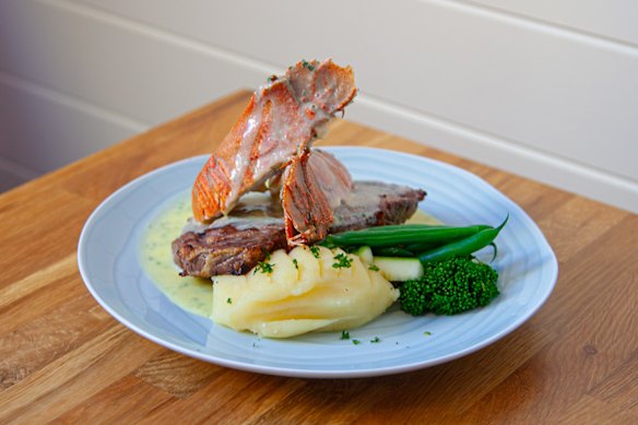 Rib fillet steak with Moreton bay bug and white wine cream garlic sauce.