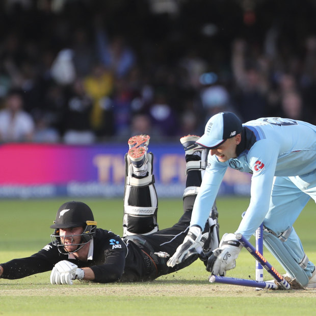 England’s Jos Buttler runs out New Zealand’s Martin Guptill during the super over at Lord’s four years ago.