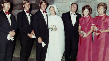 Chris and Lynette Dawson on their wedding day. His twin brother Paul is at left.