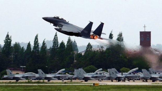 A South Korean Air Force fighter jet takes off from an air base.