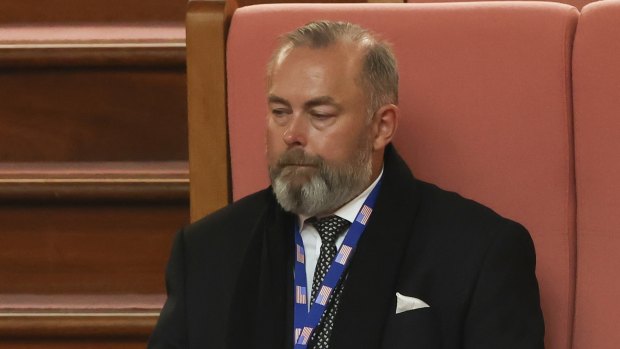 Andrew Landeryou, the husband of late Senator Kimberley Kitching, sits in the public gallery during a Senate condolence motion.