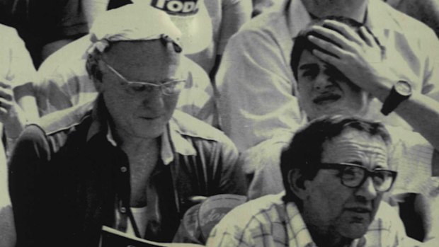 Left: A sensible man wearing a sensible hat, fashioned from his handkerchief. And right: Two idiots.