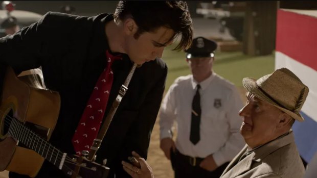 Austin Butler as Elvis Presley and Tom Hanks as manager Colonel Tom Parker in Baz Luhrmann’s Elvis.