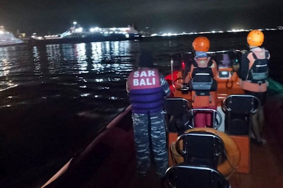 Rescuers search for victims after a ferry sank between East Java and Bali.