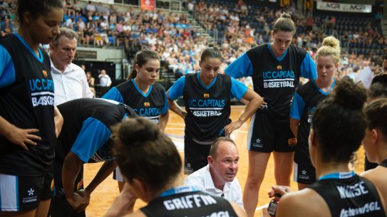 Capitals coach Paul Goriss speaks to his team. 