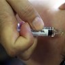 Roll out flu jabs sooner, experts say, amid fears of dual infections