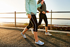 two senior women walking together in morning