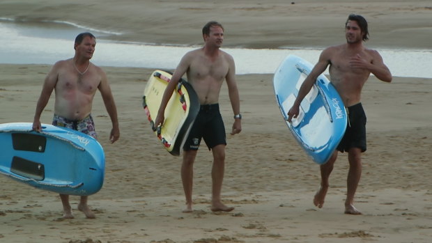 Lifeguards tried to save the men, who were washed up to 500 metres off shore.