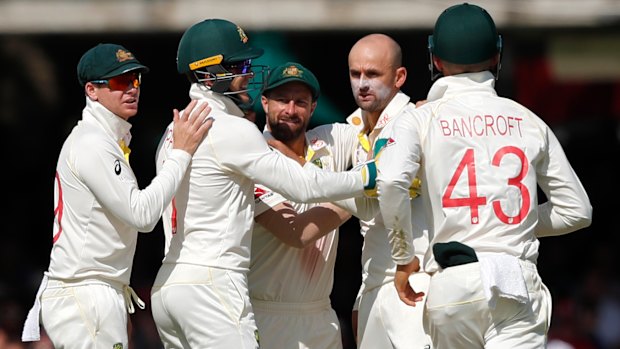 Nathan Lyon celebrates the wicket of Ben Stokes.