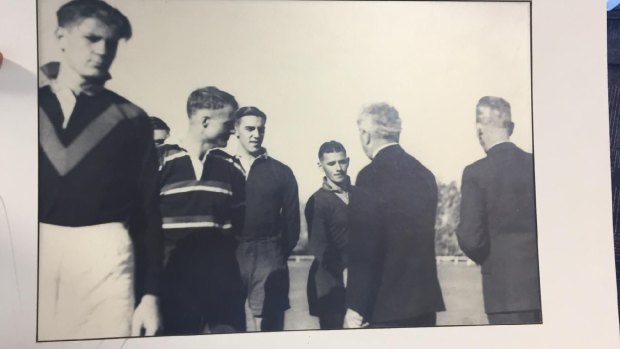 'The Originals': Players from Easts, University, Norths and RMC meet Prime Minister Joe Lyons before the first Canberra rugby game in 1938.
