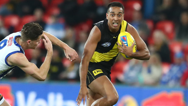 Making his mark: Richmond's Derek Eggmolesse-Smith in action during the round 7 win over North Melbourne.