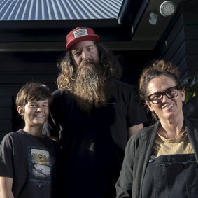 Chris and Kelly Searle (pictured with their son Max) at their former Newport home.