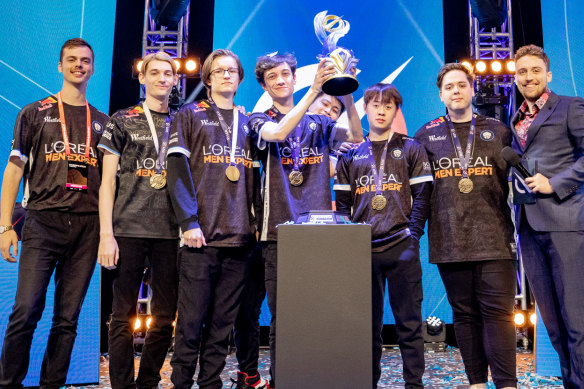Brandon Alexander with his Chiefs Esports Club team after its League Circuit Oceania grand final win.