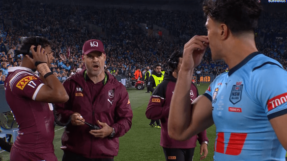 Queensland assistant coach Nate Myles sledges Joseph Suaalii after he was sent off.