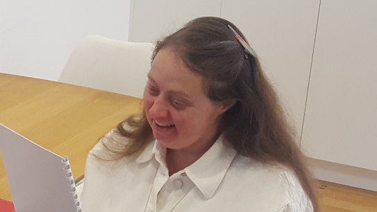 Ruth Cromer at home in Randwick. She has been unable to work after her disability support worker tested positive to COVID-19.