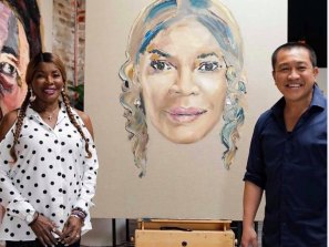 Anh Do with Marcia Hines and the portrait he painted of the singer for Brush With Fame.