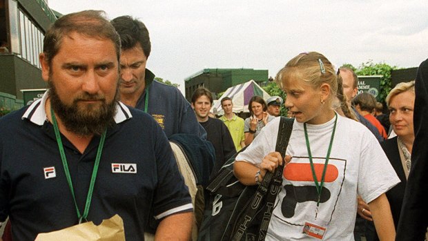 Mental, emotional and physical abuse: Jelena Dokic with her father, Damir, at Wimbledon in 1999.