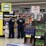 A Woolworths worker was stabbed while stacking shelves.