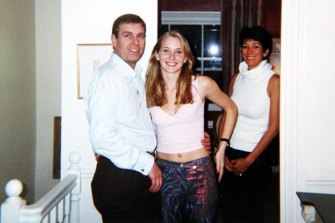 Prince Andrew pictured with Virginia Giuffre, then Roberts, at the home of recently convicted sex-trafficker  Ghislaine Maxwell (right) in London in 2001.  