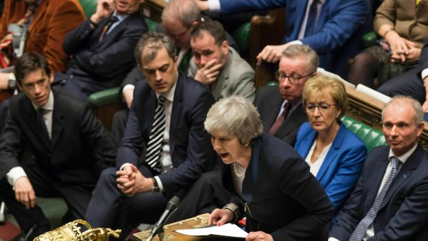 British Prime Minister Theresa May speaks in the House of Commons in London after losing a vote on her Brexit plan on Wednesday, Australian time.