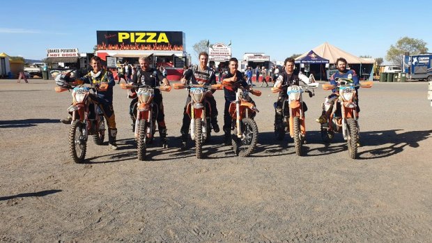 Jason Stewart, on bike 799, at the Finke Desert Race two years ago with friends. He says it is maddening that border closures will stop him racing this year. 