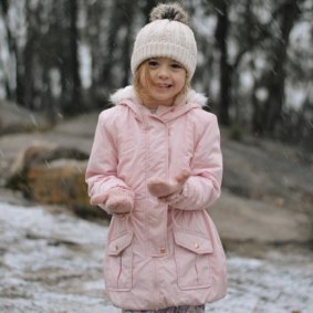 Caitlin Lancaster enjoys the snow on the Granite Belt.