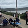 Strong winds caused a 50-year-old kite surfer become entangled on power lines at Umina Beach.