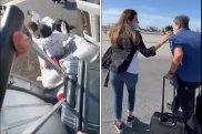 Video posted on Twitter shows passengers wheeling suitcases off burning plane in Miami
