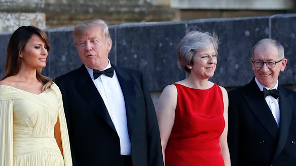 From left, first lady Melania Trump, US President Donald Trump, British Prime Minister Theresa May and her husband Philip May during the arrival ceremony at Blenheim Palace.