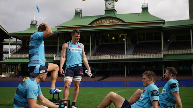 Ready: Jack Dempsey and other Waratahs players soak up the atmosphere at the SCG ahead of a Super Rugby match earlier this year. 