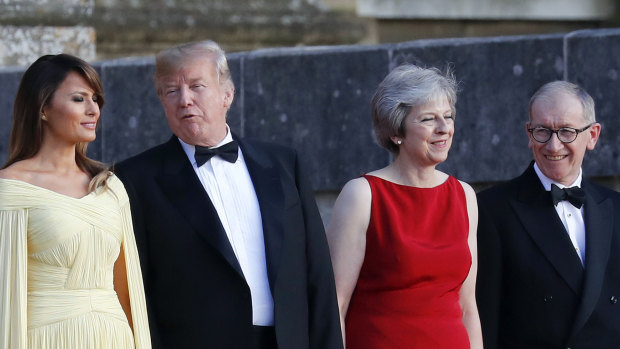 From left, first lady Melania Trump, US President Donald Trump, British Prime Minister Theresa May and her husband Philip May during the arrival ceremony at Blenheim Palace.