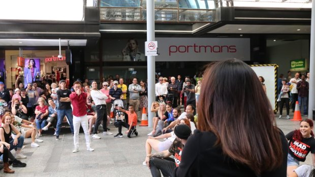 A flash mob proposal in Queen Street Mall saw about 60 Brisbane dancers perform.