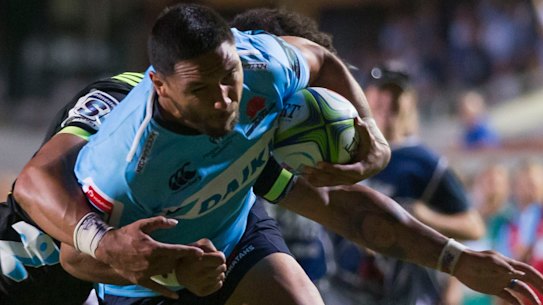 Wide man: Curtis Rona gets on the outside of Ardie Savea at Brookvale Oval.