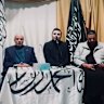 Grand Mufti of Australia Dr Ibrahim Abu Mohamad on left, sitting next to Wassim Doureihi and Bilal Merhi, from Hizb ut-Tahrir, at a memorial in 2023. 