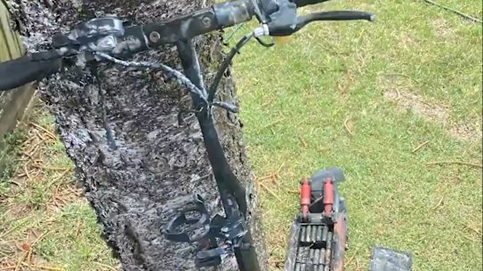 Five people were taken to hospital after an e-scooter caught fire in a Brisbane home.