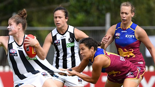 Brianna Davey tackled by Alexandra Anderson.