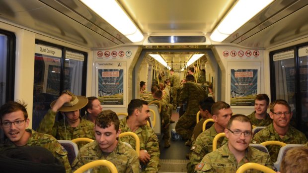 Service personnel on board Sunday's Remembrance Day troop train.