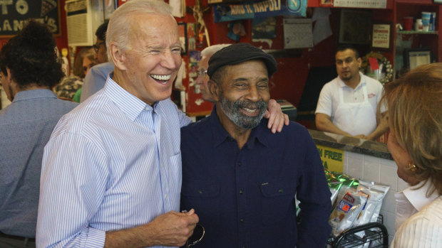 Democratic presidential candidate and former vice-president Joe Biden greets people at Gianni's Pizza, in Wilmington, Delaware, on Thursday. 
